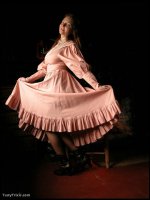 Prairie Girl dress flipped up to reveal furry bush,  stockings & ankle boots.