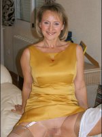 Amateur MILF Michelle showing her big mature tits and sexy legs in nylons