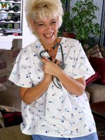 Mature blonde nurse slide out of her uniform and smiles