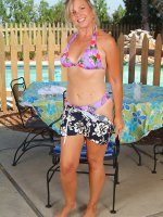 Cricket peels off her suit and plays with her pussy outside