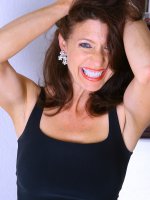 Long haired brunette MILF Madison shows off her hot body