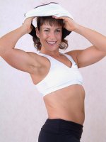 Furry pussied Andie works out and then spreads legs